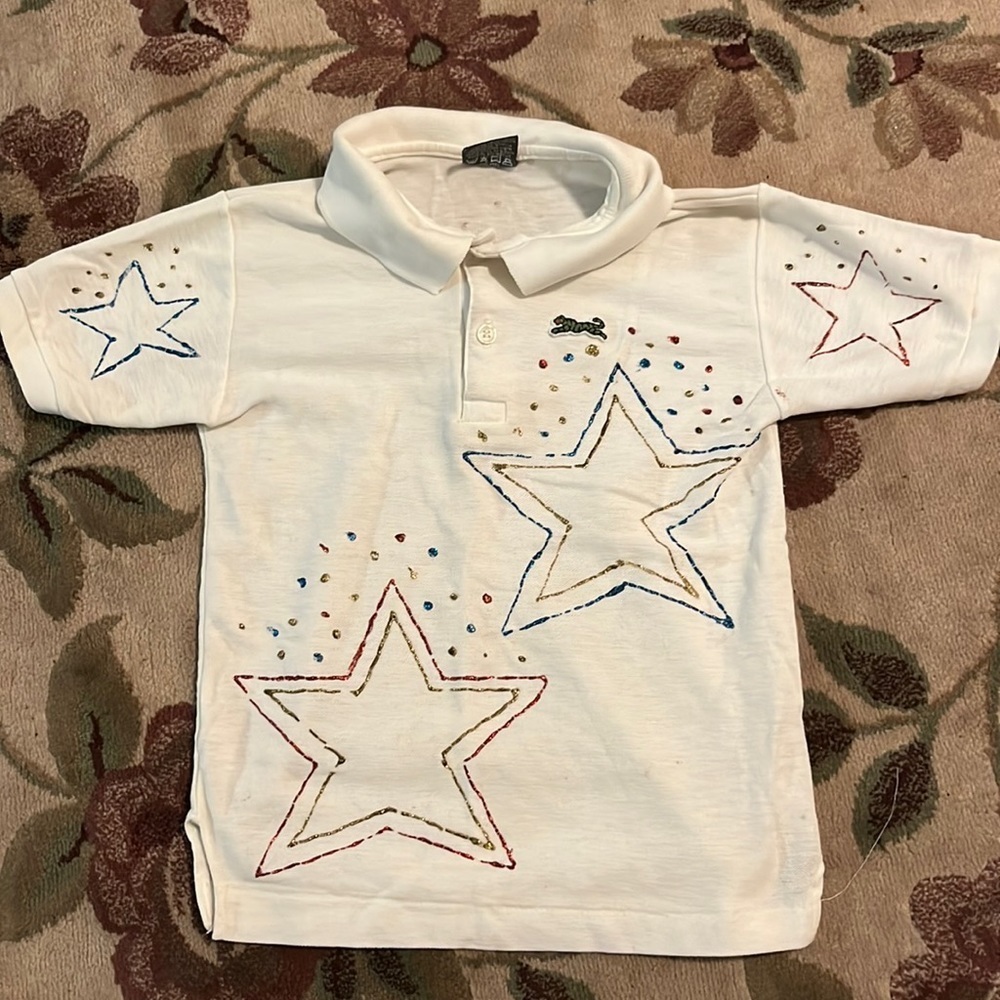 Le Tigre white polo with puff paint stars